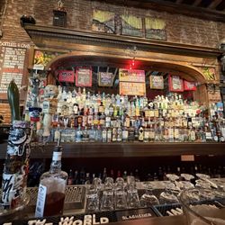 Tempest - Partial drink selection with a nice wooden shelf