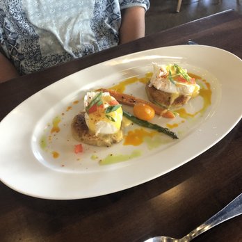 Maison Pucha Bistro - eggs "benedict" on plantain cake - French Near Me - Houston, Texas Maison Pucha Bistro - eggs "benedict" on plantain cake - French Near Me - Houston, Texas