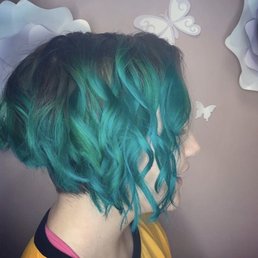 Teal asymmetrical haircut Teal asymmetrical haircut