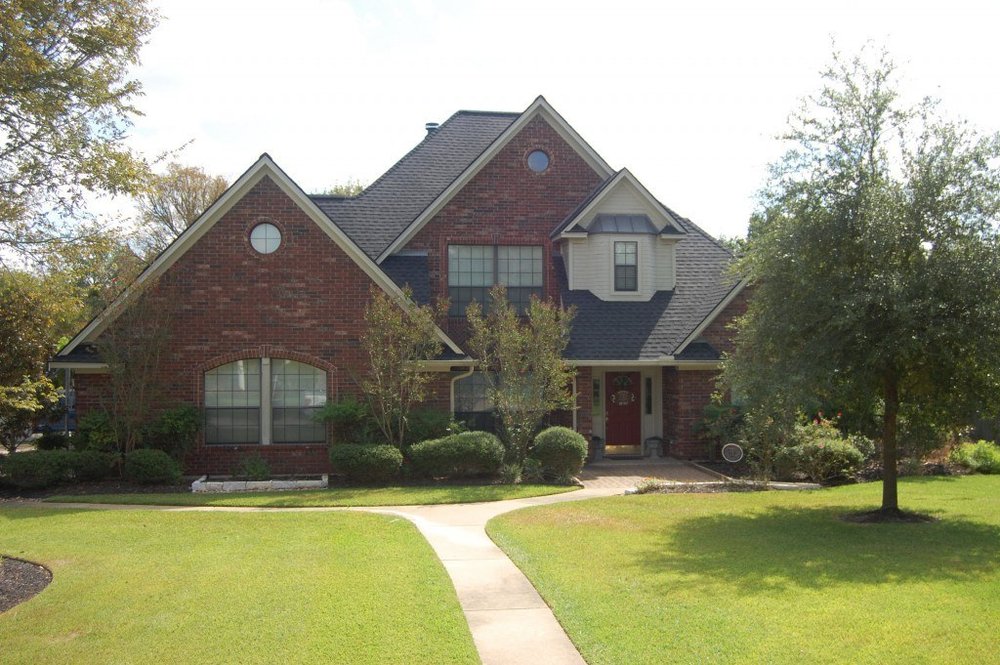 Slide of State Roofing Company