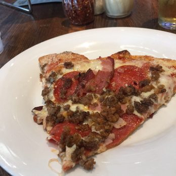 Mellow Mushroom Somerset - Lots of sausage, bacon and pepperoni and of course cheese! - Pizza Near Me - Somerset, Kentucky Mellow Mushroom Somerset - Lots of sausage, bacon and pepperoni and of course cheese! - Pizza Near Me - Somerset, Kentucky