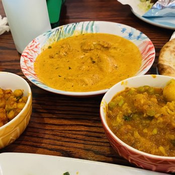 Baba Ganoush Mediterranean Grill - Butter curry came complimentary naan; two side dishes: chickpeas; potatoes and cauliflower - Mediterranean Near Me - Fredericksburg, Virginia Baba Ganoush Mediterranean Grill - Butter curry came complimentary naan; two side dishes: chickpeas; potatoes and cauliflower - Mediterranean Near Me - Fredericksburg, Virginia