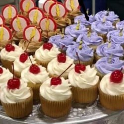 Quigley's Cakes - Pina colada cupcakes have rum cake, pineapple custard filling and coconut buttercream.