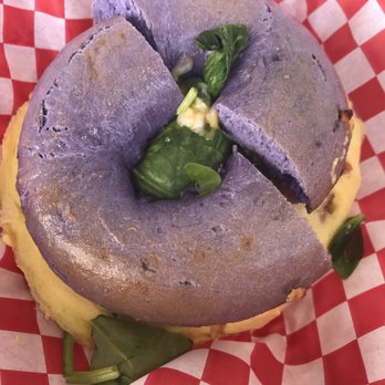 Bogart's Cafe - Taro bagel sandwich with spinach and Portuguese sausage - Breakfast & Brunch Near Me - Honolulu, Hawaii Bogart's Cafe - Taro bagel sandwich with spinach and Portuguese sausage - Breakfast & Brunch Near Me - Honolulu, Hawaii