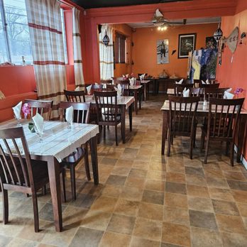 Abyssinia Ethiopian Restaurant - a dining area with tables and chairs - Ethiopian Near Me - Memphis, Tennessee Abyssinia Ethiopian Restaurant - a dining area with tables and chairs - Ethiopian Near Me - Memphis, Tennessee