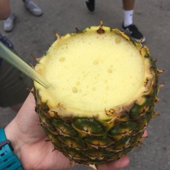 Smorgasburg - Pineapple Drink in a hollowed-out Pineapple - Street Vendors Near Me - Brooklyn, New York Smorgasburg - Pineapple Drink in a hollowed-out Pineapple - Street Vendors Near Me - Brooklyn, New York