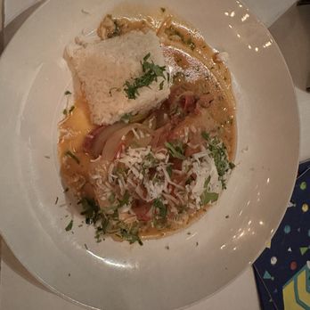 Rio's - Grilled Fish of The Day with Coconut Curry, rice and Peruvian potatoes - Latin American Near Me - Addison, Illinois