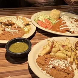 Enfrijoladas, chilaquiles verdes, chorizo burrito.