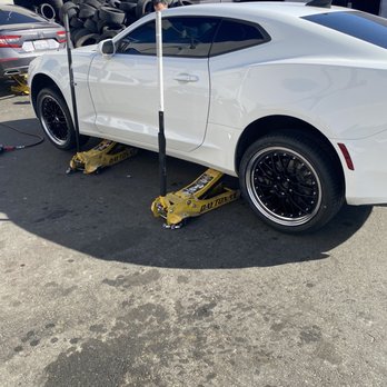 Perris Tires & Wheels - Jacked up - Tires Near Me - Perris, California