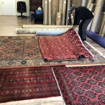 Capital Rug Cleaning - Mr. Hamid Wardak laying out and assessing my rugs. - Carpet Cleaning Near Me - Severna Park, Maryland