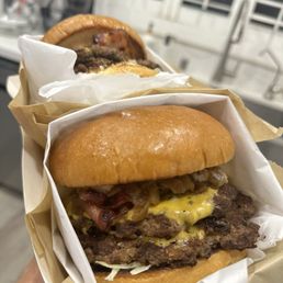 Double patty cheeseburger with caramelized onions.