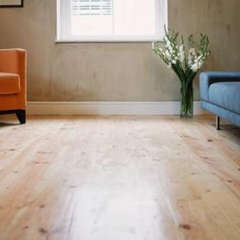 East Coast Flooring - a living room with hardwood floors - Flooring Near Me - Ocala, Florida East Coast Flooring - a living room with hardwood floors - Flooring Near Me - Ocala, Florida