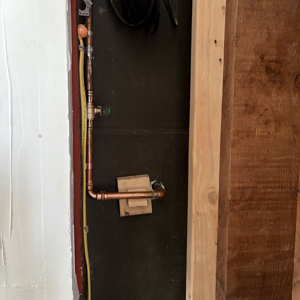 Rerouted pipe to outside hose bib Rerouted pipe to outside hose bib