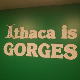 a green wall with white lettering a green wall with white lettering