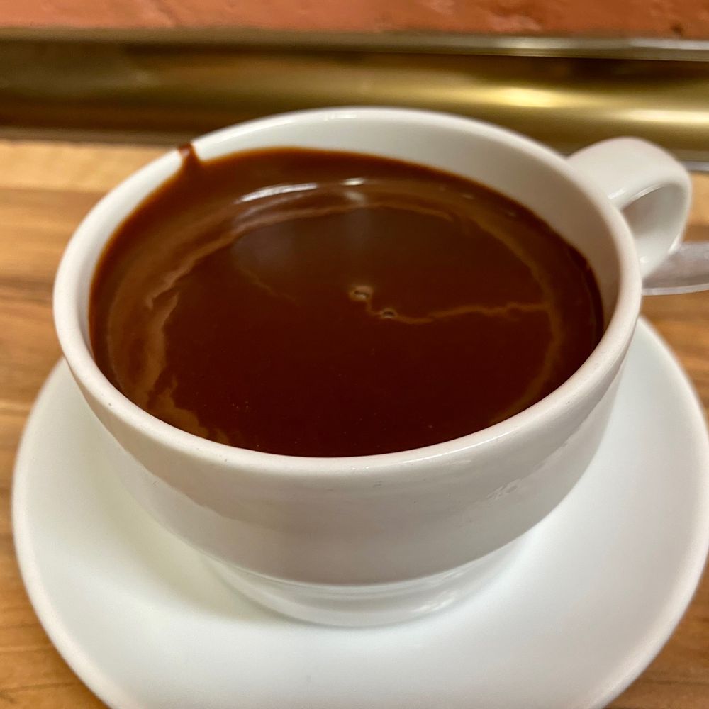Xurrería Laietana - Hot dipping chocolate for the churros - Churros Near Me - Barcelona, B Xurrería Laietana - Hot dipping chocolate for the churros - Churros Near Me - Barcelona, B