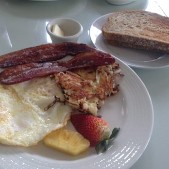 Jackie's Cafe - Two eggs, bacon, kitchen potatoes, and multi-grain toast: $10. - Diners Near Me - New Buffalo, Michigan Jackie's Cafe - Two eggs, bacon, kitchen potatoes, and multi-grain toast: $10. - Diners Near Me - New Buffalo, Michigan