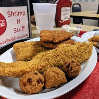 Shrimp N Stuff - catfish (middle), tilapia (top) and hushuppies - Seafood Near Me - Galveston, Texas Shrimp N Stuff - catfish (middle), tilapia (top) and hushuppies - Seafood Near Me - Galveston, Texas