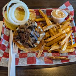 Brews Brothers Pub - Garlic butter burger with onion and pepper. Jack cheese on homemade bun with homemade fries and sauce. All homemade.