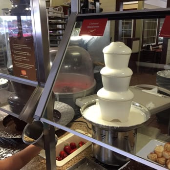 Golden Corral Buffet & Grill - Chocolate and white chocolate fountains.  Freshly spun cotton candy machine in back - Buffets Near Me - Humble, Texas