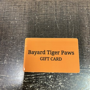 Bayard Tiger Paws - a gift card on a table - Gas Stations Near Me - Bayard, Nebraska