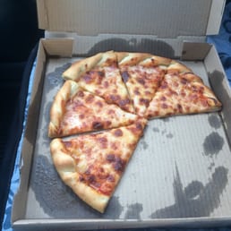 The oily gross cheese pizza from tiki man pizza. Yuk! The oily gross cheese pizza from tiki man pizza. Yuk!