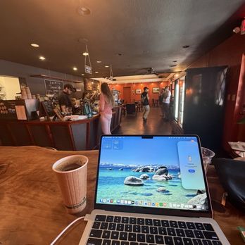 Firecreek Coffee - Working at the high top table with black coffee - Coffee & Tea Near Me - Sedona, Arizona