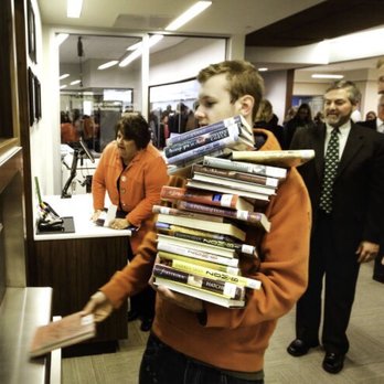 Metropolitan Community College - Christopher Christie becomes the first Blair citizen to return books through the new library's automated check in system. - Libraries Near Me - Blair, Nebraska
