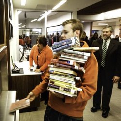 Metropolitan Community College - Christopher Christie becomes the first Blair citizen to return books through the new library's automated check in system.