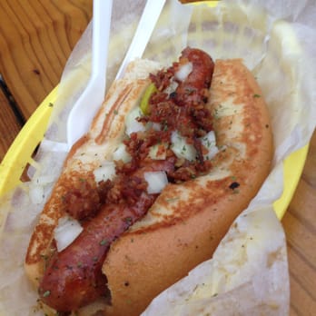 Dat Dog - Hot sausage with onions, bacon and banana peppers. FYI, the banana peppers aren't sliced, so you might get a big ol' bite - Hot Dogs Near Me - New Orleans, Louisiana