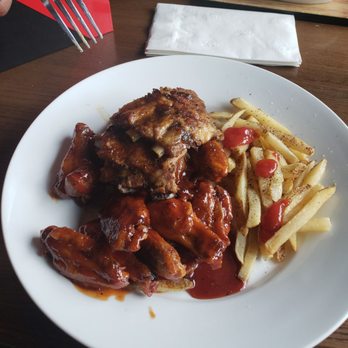 TGI Fridays - Bucket of bones (minus the bucket) lol Ribs, wings and fries. - American Near Me - Lithonia, Georgia TGI Fridays - Bucket of bones (minus the bucket) lol Ribs, wings and fries. - American Near Me - Lithonia, Georgia