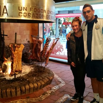 La Estancia - The meat is being cooked right  in front of the restaurant  so you can see how authentic their barbecue really is. Very cool - Argentine Near Me - Buenos Aires, C