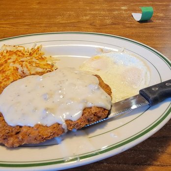 Lumberjacks - a plate of fried chicken with gravy and hash browns - American Near Me - Grass Valley, California