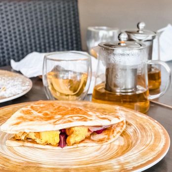 Schasteâ - a plate of food on a table - Tea Rooms Near Me - Providence, Rhode Island Schasteâ - a plate of food on a table - Tea Rooms Near Me - Providence, Rhode Island