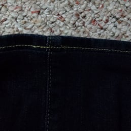 Example of their original hem line. Vertical seam isn't lined up and aparent gap between new and original hem. Example of their original hem line. Vertical seam isn't lined up and aparent gap between new and original hem.