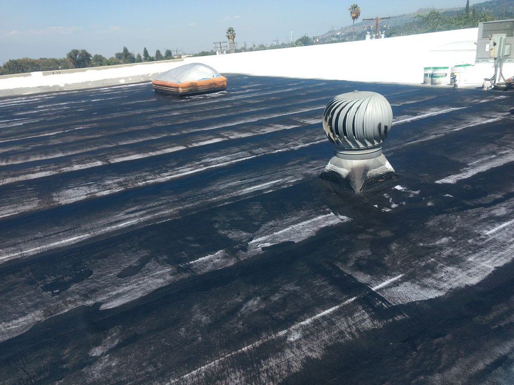 Slide of Benitez Roofing & Waterproofing