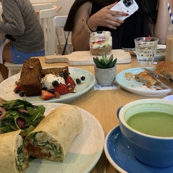 Bluestone Lane Walnut Street Café - Burrito, yogurt, banana bread, almond croissant - Breakfast & Brunch Near Me - Philadelphia, Pennsylvania
