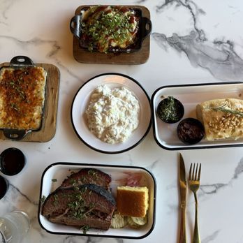 Oak & Ember - Chilli Rellano (top) , Potato Salad (middle), Focaccia Bread (right), Brisket (bottom), Mashed Potatoes (left) - Halal Near Me - Ontario, California Oak & Ember - Chilli Rellano (top) , Potato Salad (middle), Focaccia Bread (right), Brisket (bottom), Mashed Potatoes (left) - Halal Near Me - Ontario, California
