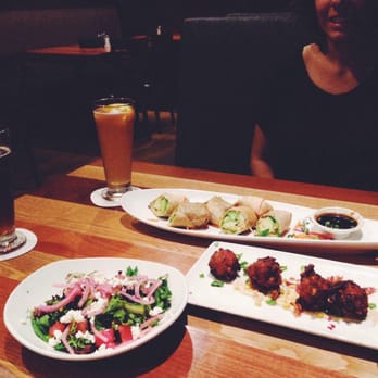 BJ's Restaurant & Brewhouse - Handcrafted beers (dark: nutty brewnette, Light: harvest hefeweizen), Spicy avocado rolls, corn fritters, watermelon feta salad - Pizza Near Me - Brea, California