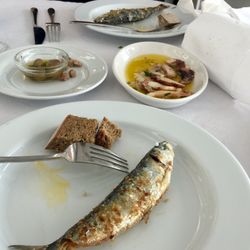Dom Peixe - Freshly grilled sardines, octopus salad in the middle of the table