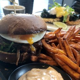 A royally stacked sammie with braised beef, pastrami, provolone & over easy egg held together w/tarragon mayo. With sweet potato fries.