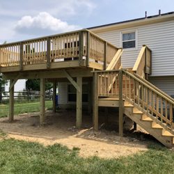 By Designer Deck - There is a lot of people that loves the look of the wood. Here is nice sample of a deck all in PT Lumber.