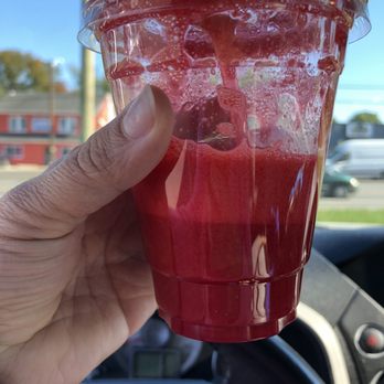 Nature's cafe & Juice Bar - a hand holding a cup of juice - Juice Bars & Smoothies Near Me - Vineland, New Jersey Nature's cafe & Juice Bar - a hand holding a cup of juice - Juice Bars & Smoothies Near Me - Vineland, New Jersey