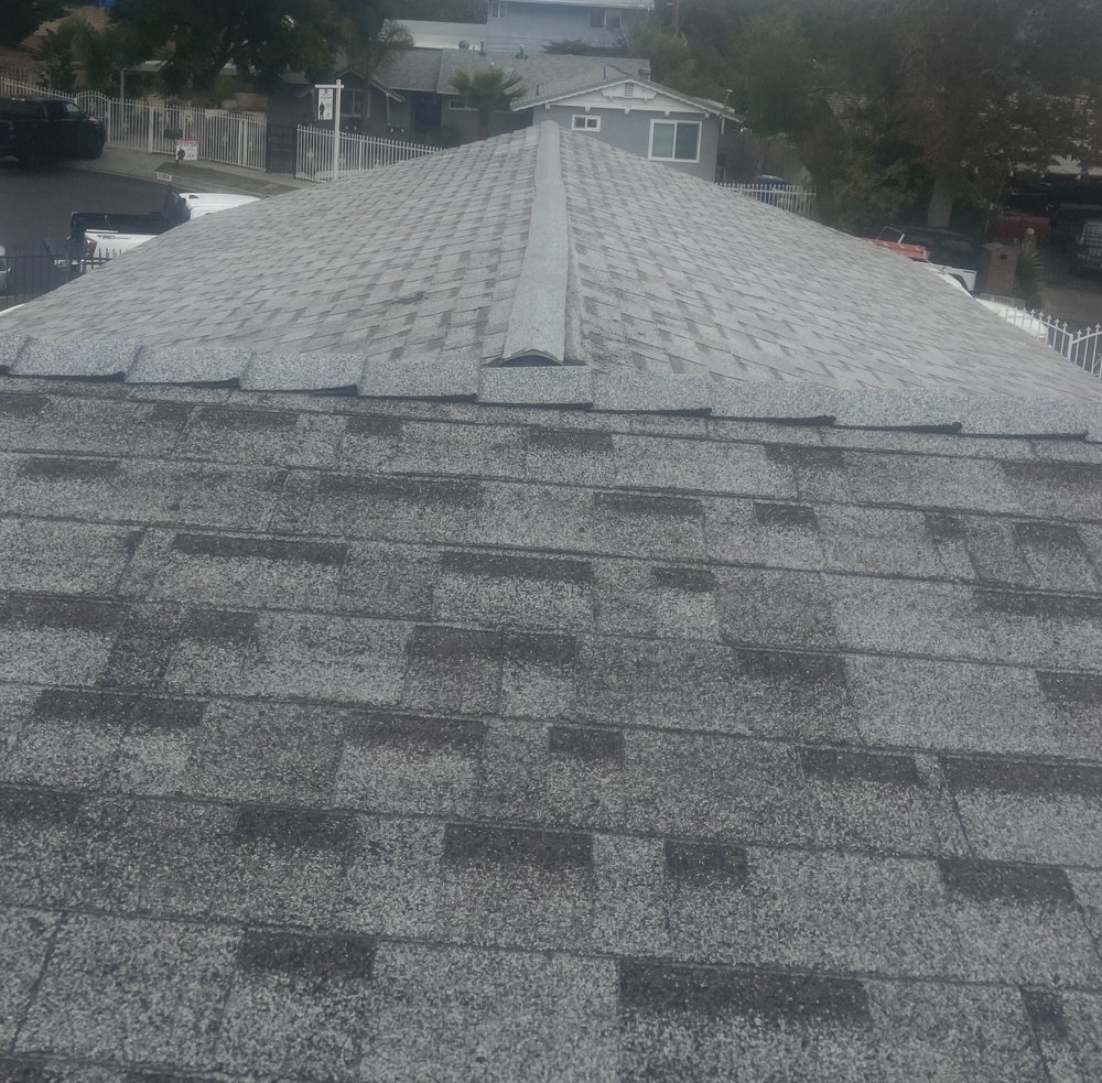 Slide of Armandos Roofing