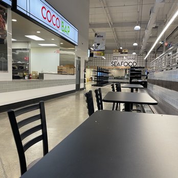 CocoDak - empty tables and chairs in a restaurant - Korean Near Me - Stockton, California