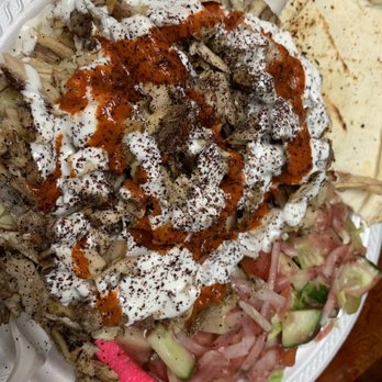 Pita Nutso - Chicken with rice and salad. Their white garlic sauce is really good. - Mediterranean Near Me - Mississauga, Ontario Pita Nutso - Chicken with rice and salad. Their white garlic sauce is really good. - Mediterranean Near Me - Mississauga, Ontario