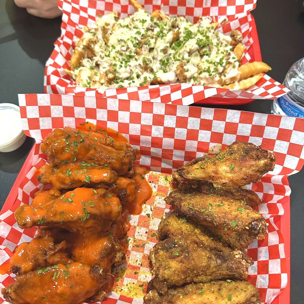 Valley Wings - Traditional buffalo wings (L) Lemon pepper dry rub (R) Chicken alfredo fries (top) - Chicken Wings Near Me - Scottsdale, Arizona