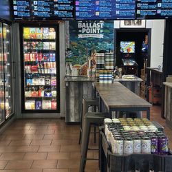 Kings Beer & Wine - Growler/crowler sealer and section