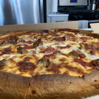 Connie's Pizza - Pepperoni and sausage pizza - Pizza Near Me - Chicago, Illinois
