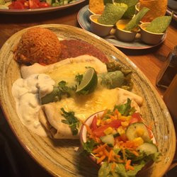 Enchilada - Enchiladas combination (includes 1 chicken, 1 vegetarian, & 1 chile con carne)