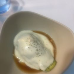 Lilium - Roasted avocado, with goat cheese and vegetables broth.